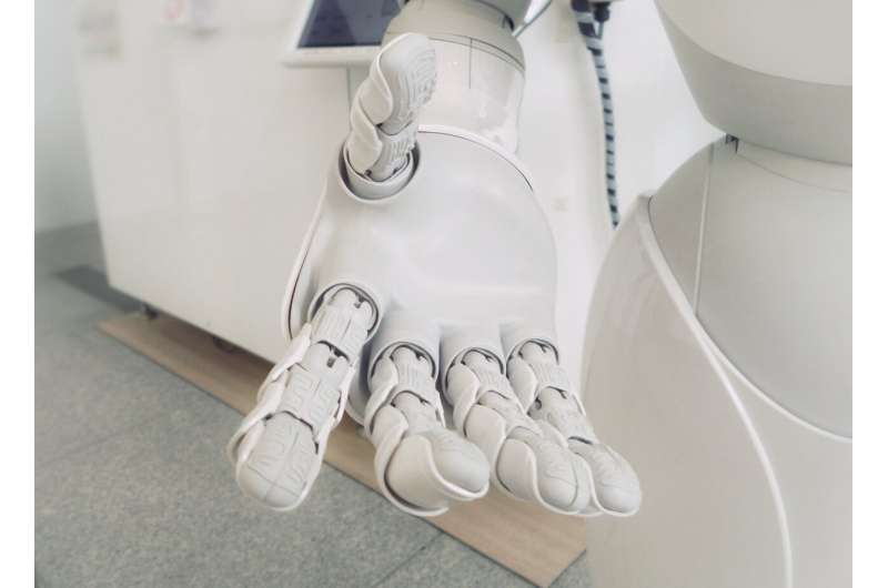 Do humans get lazier when robots help with tasks?